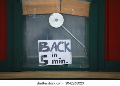 A Handwritten Sign Reads 