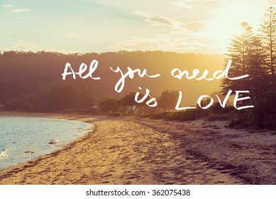 Handwritten text over sunset calm sunny beach background, ALL YOU NEED IS LOVE, vintage filter applied, motivational concept image