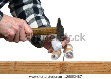 a handyman awkward trying to hammer a nail