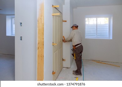 Handyman Install The New Twin Door In The Room