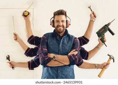 Handyman, tools and multitask in workshop for portrait, busy and DIY or small business. Male carpenter, equipment and smile in workroom for pride, confident and skills in industry or maintenance - Powered by Shutterstock