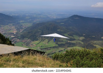 Hang Glider Flying In The German Alps