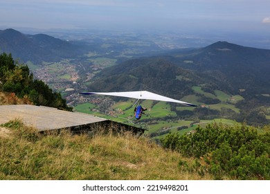 Hang Glider Flying In The German Alps