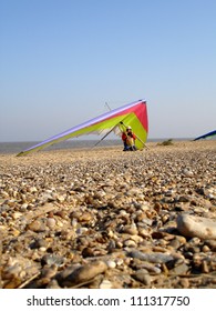 Hang glider on beach