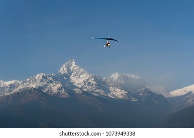 A Hang Gliding Fly Over The Himalaya Mountains 