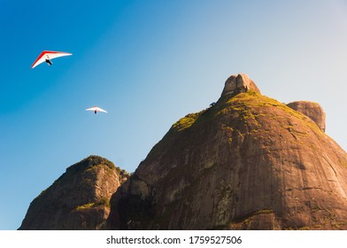 Hang Gliding Off The High Mountains In Rio De Janeiro, Brazil