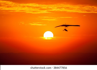 Hang Gliding In The Sunset