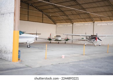 Hangar with some beautiful colorful aircraft