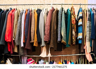 Hanger with free clothes in humanitarian centre. - Shutterstock ID 2177461275