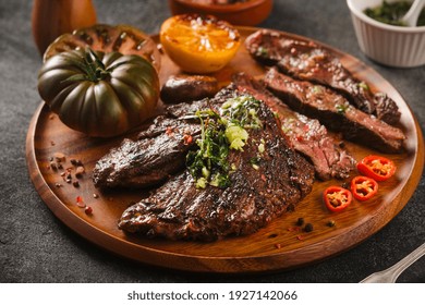 Hanger Steak Bbq With Souce Chimichurri On Wooden Plate, Close Up.