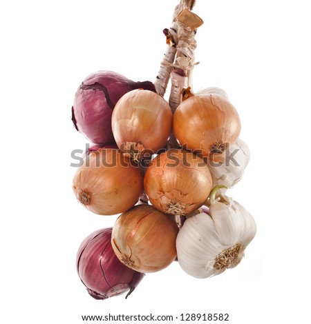hanging bunch bundle of onion and garlic clove isolated on white background