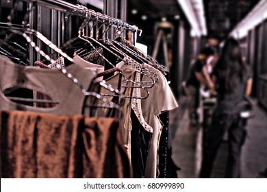 A Hanging Clothes Rack Put In The Corridor In Backstage Of Fashion Show