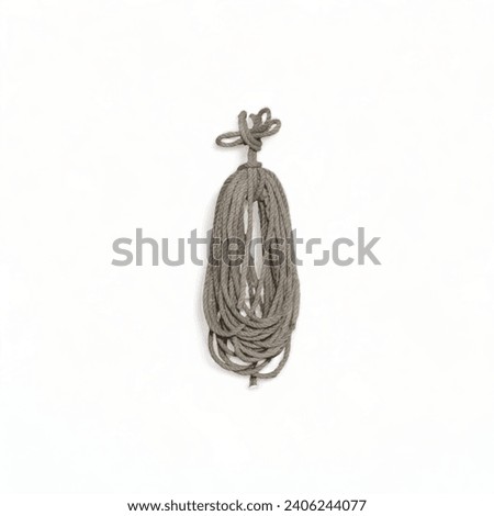 Hanging coiled rope with Marimaro knot