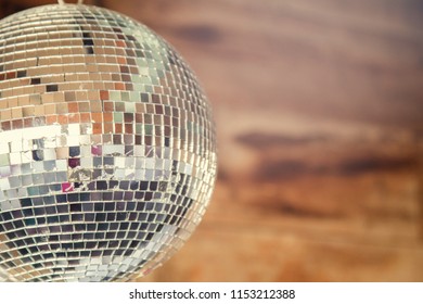 hanging, cracked disco ball