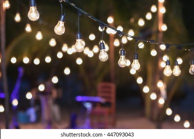 Hanging Decorative Lights For A Wedding Party