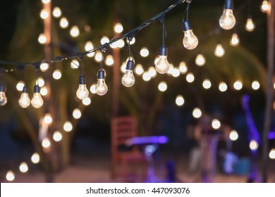 Hanging Decorative Lights For A Wedding Party