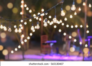 Hanging Decorative Lights For A Wedding Party