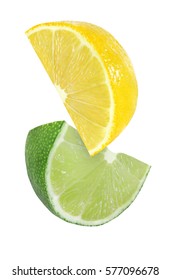 Hanging, falling and flying piece of lemon and lime fruits isolated on white background with clipping path