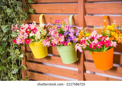 Hanging Flower Pots with fence - Shutterstock ID 2117586725