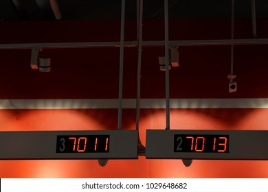 Hanging LED panel queue in a room