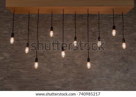 hanging light bulbs on grey background