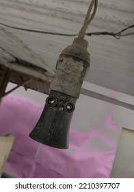 The Hanging Light Fitting Looks Old And Dirty.