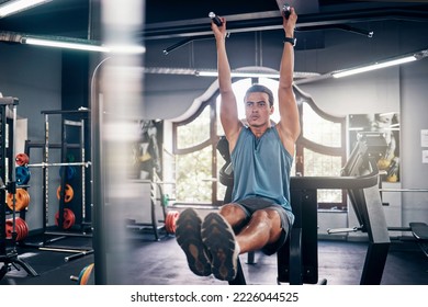 Hanging man, gym and leg raise exercise, workout and training for muscle, fitness power and bodybuilding sports. Bodybuilder athlete guy lifting legs up with focus for strong core, abs and wellness - Shutterstock ID 2226044525