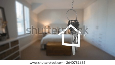 Hanging metal key ring featuring several keys in bedroom interior, with house-shaped charm. Accessories, decor, minimalism, interior, cozy, lifestyle, warmlighting
