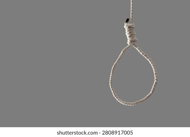 Hanging rope with loop on grey background. Suicide concept