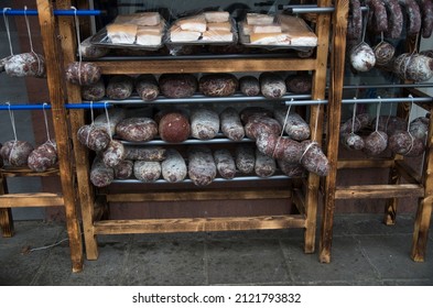 Hanging Sausages In Front Of A Butcher Shop Close Up
