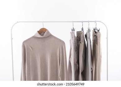 Hanging With Stylish Sweater Closeup  With Khaki Pants On Hanging