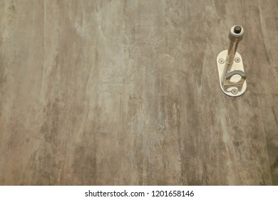 Hanging Toiletry, Hook Hanging On The Door Of The Toilet In The Bathroom., Old Paper On Wooden Background.