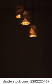 Hanging twilight lamps at the dark room - Shutterstock ID 2282225467
