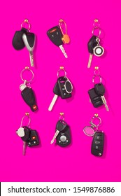 Hanging Valet Car Keys On Pink Background