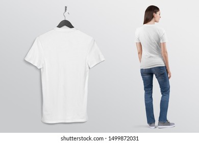 hanging white t shirt on hanger with model wearing white shirt in blue denim jeans pant isolated