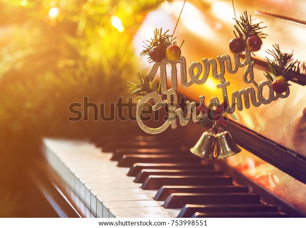 Hanging Word Merry Christmas Over Piano Stock Photo Edit Now