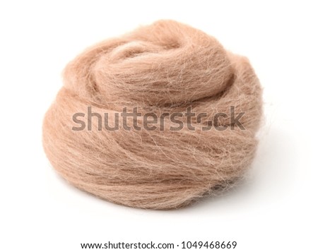 Hank of beige wool yarn isolated on white