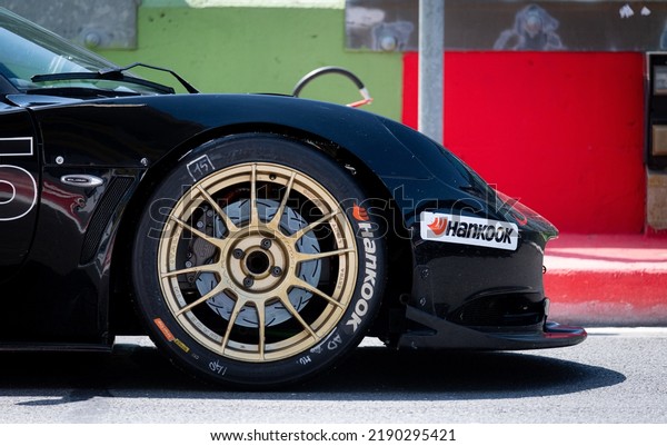 Hankook motor sport tire\
logo on racing car close up. Vallelunga, Italy. April 30 2022,\
Racing weekend