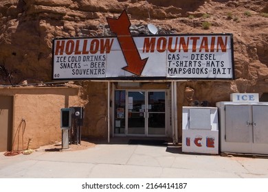 Hanksville, USA - 06.05.2022: Hollow Mountain Shop Entrance. Local Gas Station And Souvenir Shop. Convenient Store In The Mountain In Utah Desert. Building Inside Of A Rock.