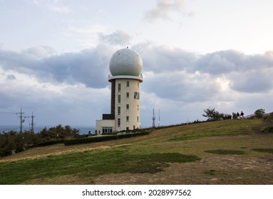 HanKyung, Jeju-si, Jeju-do, South Korea - March 21, 2021: Gosan Weather Station On Suwolbong Peak Against Dark Cloud
