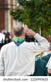 Hanley, Stoke On Trent, Staffordshire - 11th November 2018 - A Cub Scout Leader Salutes During The 100 Year Remembrance Day Parade, Service In  Albion Square, Hanley