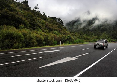 HANMER,NZ - MAR 15 2009:Car Drive On An Empty Left-hand Traffic Road Near Hanmer,New Zealand.The Distance From The Top Of The North Island To The Bottom Of The South Island Is 1,930 Km (1,200 Mi)