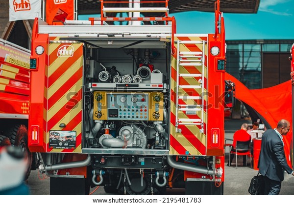 Hannover, Germany - 2022: Inside of a back part\
of a modern fire truck with all the equipment properly sorted out\
for fast action.