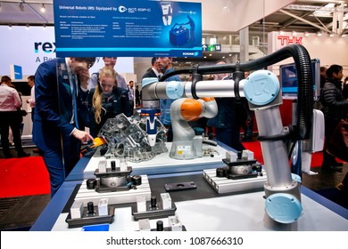 Hannover, Germany - April, 2018: Universal Robots UR5 equipped with Schunk grippers on Messe fair in Hannover, Germany