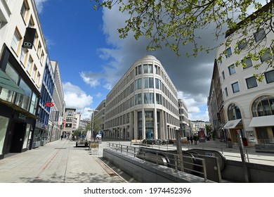 Hannover, Germany - May 16, 2021: Dark Rain Cloud Over An Almost Empty Shopping Street 