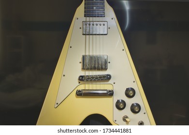 Hannover, Germany - May, 2020:  Gibson Flying V Partly Shown Body With A Blurred Black Background With Some Lightpainted