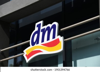 Hannover, Lower Saxony, Germany - April 12, 2020: Logo Of Dm Drugstore In Hannover Germany  -  Dm Is A Chain Of Retail Stores That Sells Cosmetics, Healthcare Items And Household Products