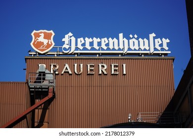 Hannover, Lower Saxony, Germany - June 29, 2022: Rusty trademark of Herrenhäuser Brewery, Hannover with jumping horse, the symbol of the federal state of Lower Saxony, Germany