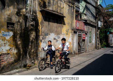 Hanoi 22th Oct 2020: Two Pupil Are Cycling To School In A Sunny Day In Long Bien District