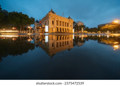 Hanoi Opera House building with reflection on water - Powered by Shutterstock